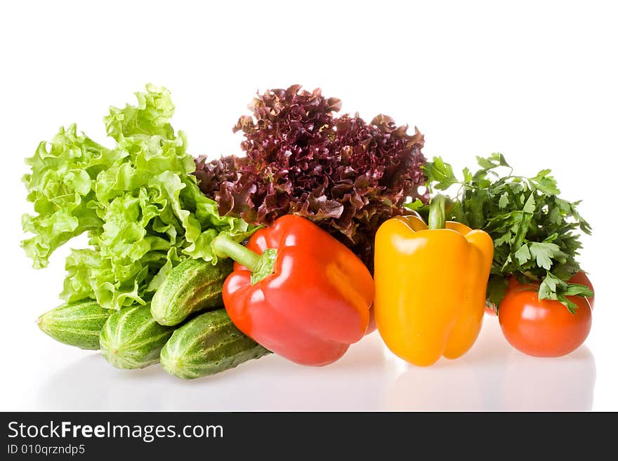 Fresh raw vegetables on a white background. Fresh raw vegetables on a white background