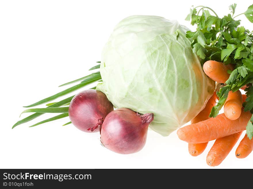 Fresh raw vegetables on a white background. Fresh raw vegetables on a white background