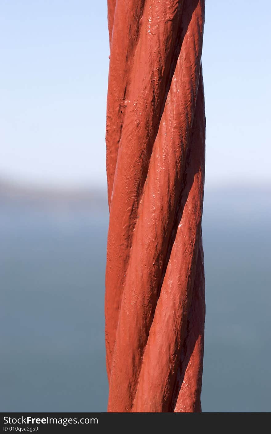 A shot of a supporting cable of the Golden Gate Bridge. A shot of a supporting cable of the Golden Gate Bridge.