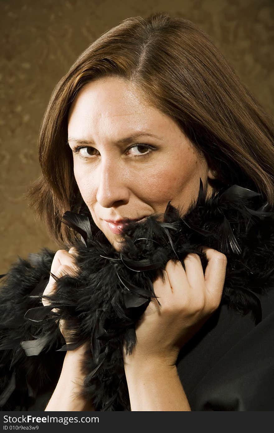 Pretty Hispanic Woman Wearing Feathers