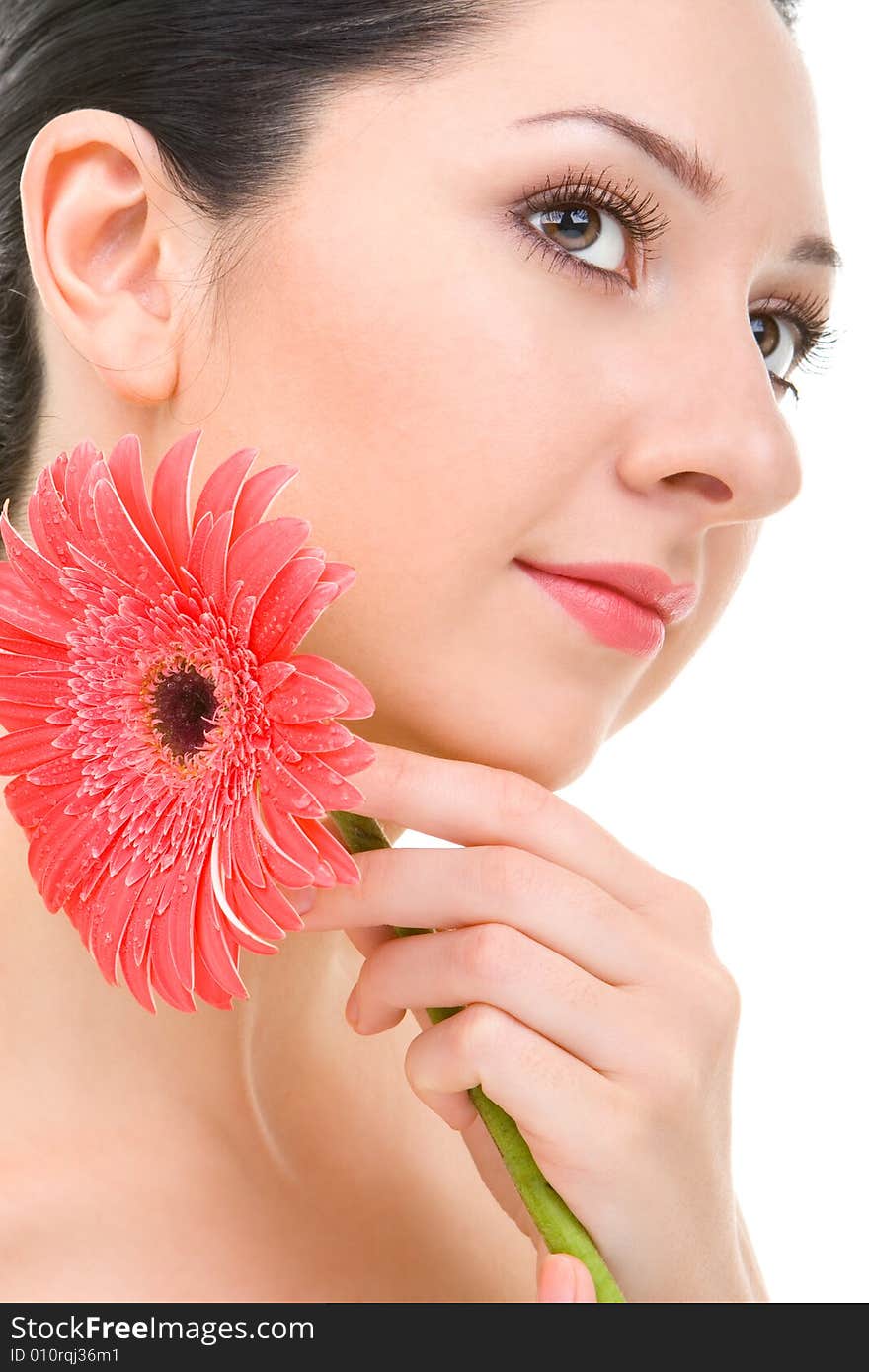 Young woman with gerber flower