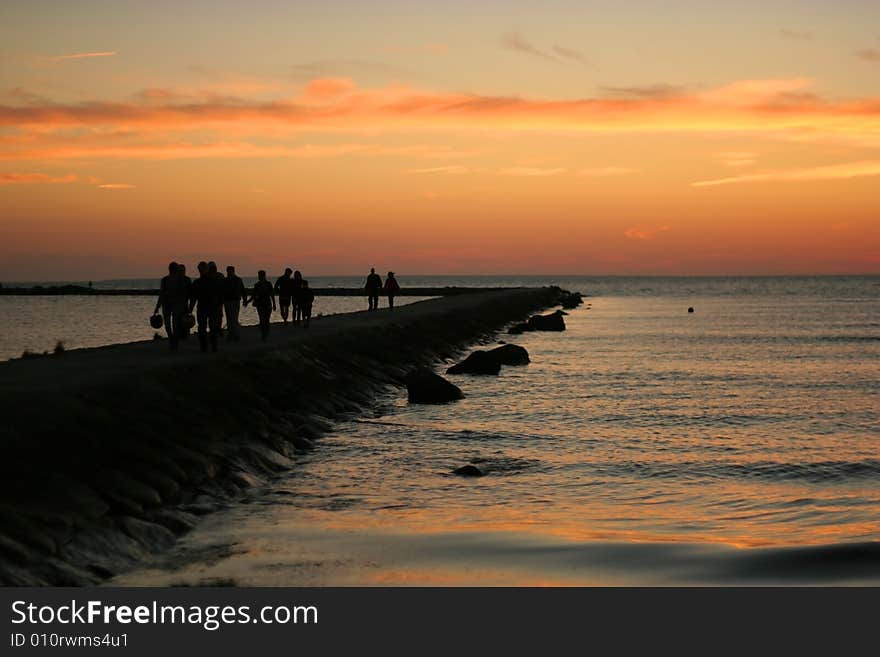 People leaving from a pier after a decline