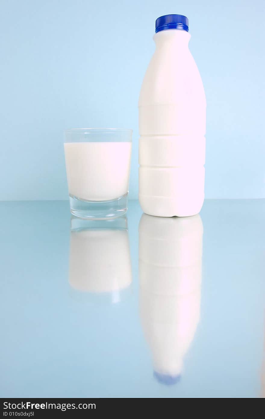 Full cream milk isolated against a blue background