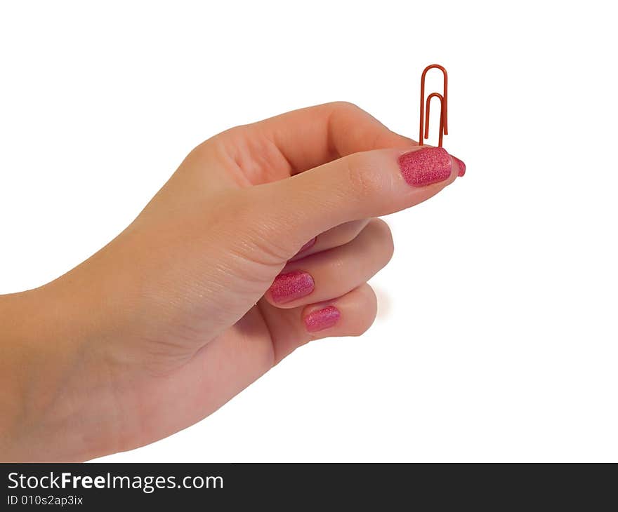 Paper clip in hand isolated on white background