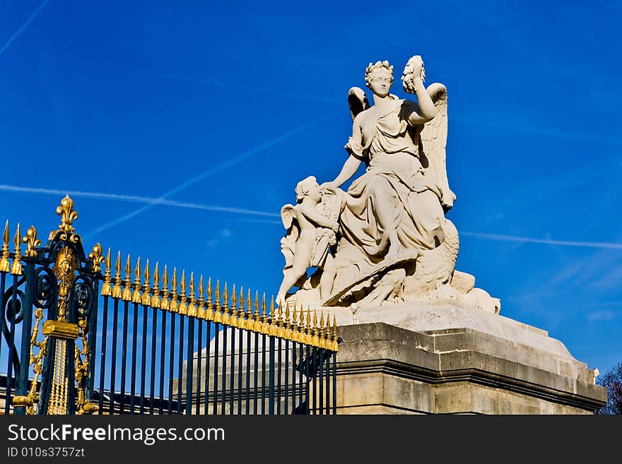 Statue At A Gate In Versailles