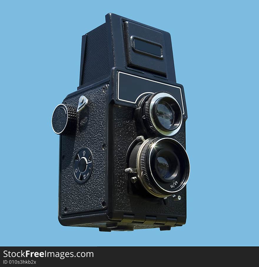 Old style camera on the blue background. Old style camera on the blue background