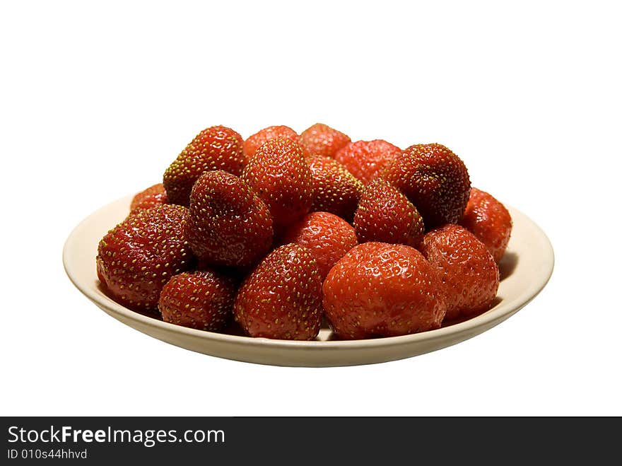 Strawberries to plate on white background