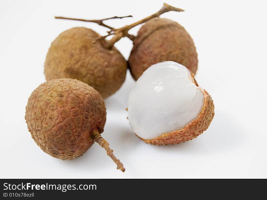 Four pieces of lychees on white background