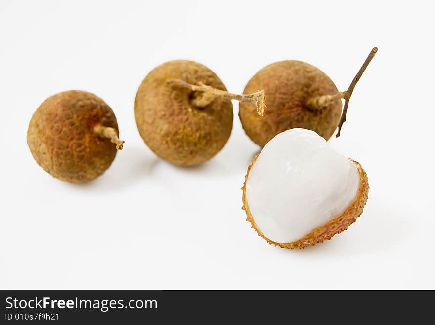 Four pieces of Lychees on white background