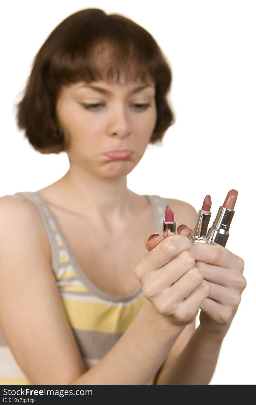 Dissapoint Woman Choosing A Lipstick