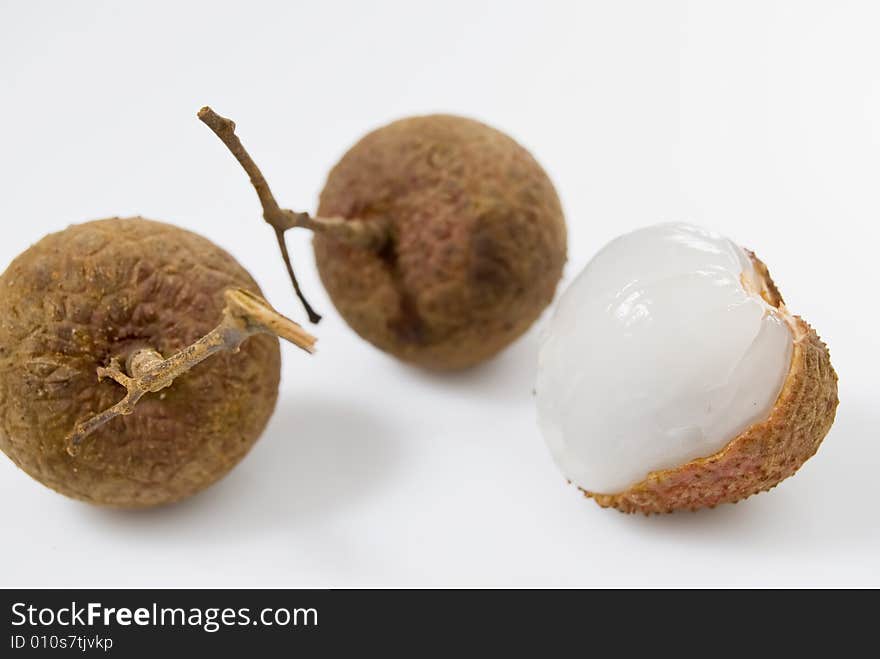 Three pieces of Lychees on white background