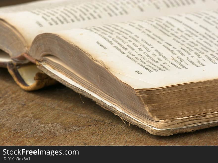 Old book in brown cover close up. Old book in brown cover close up