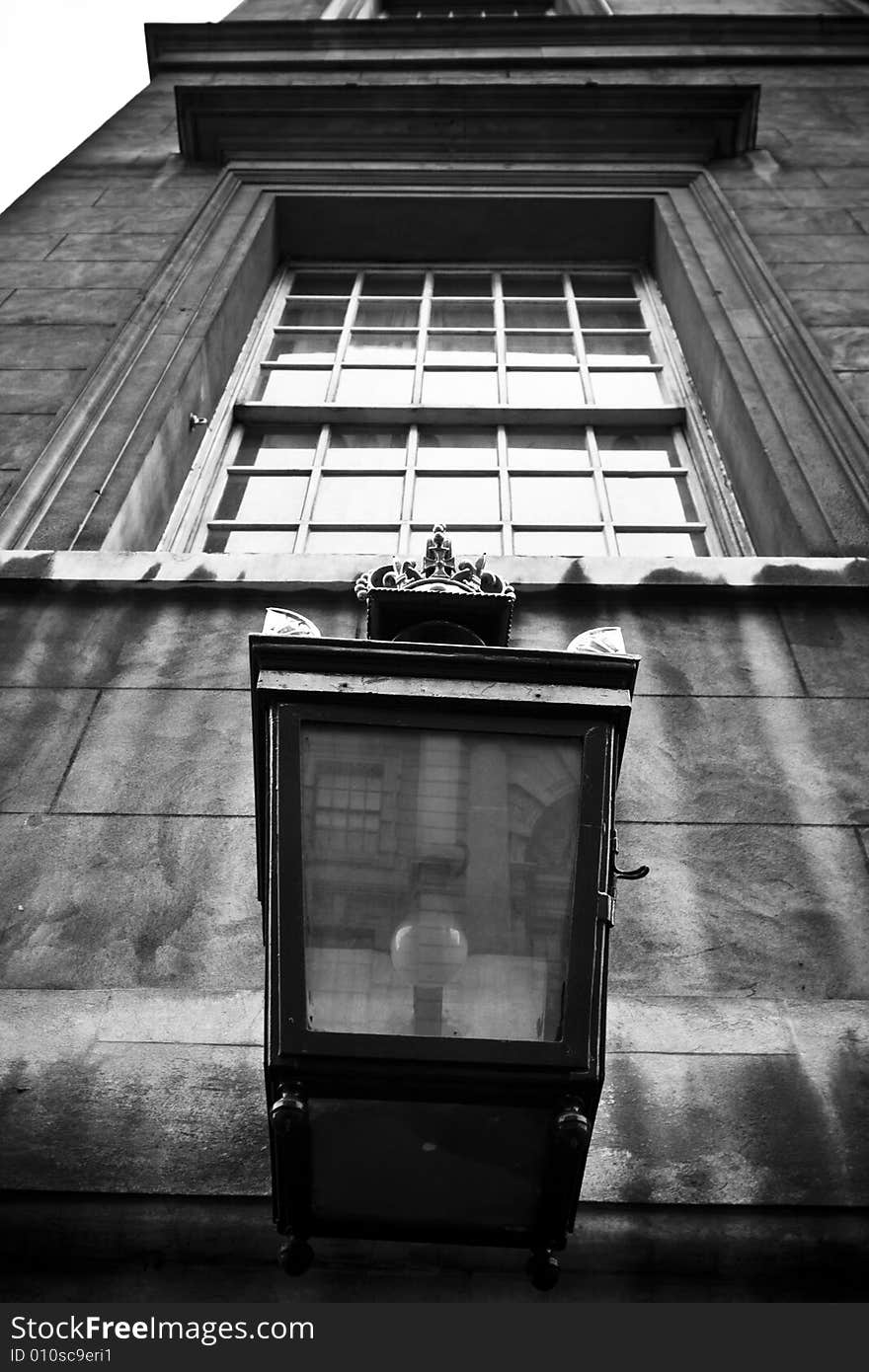 Old candle in facade