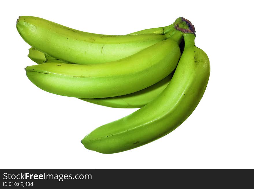 Green bananas isolated on white background, unripe fruits