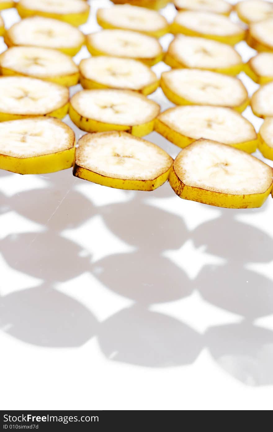 Sliced banana on white