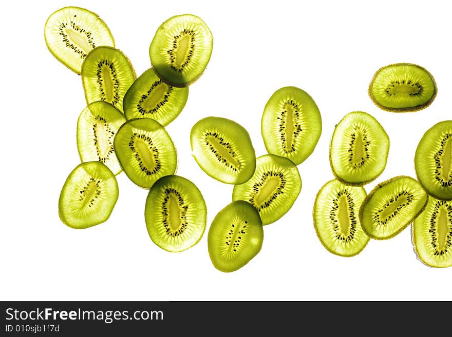 Abstract sliced kiwi on white