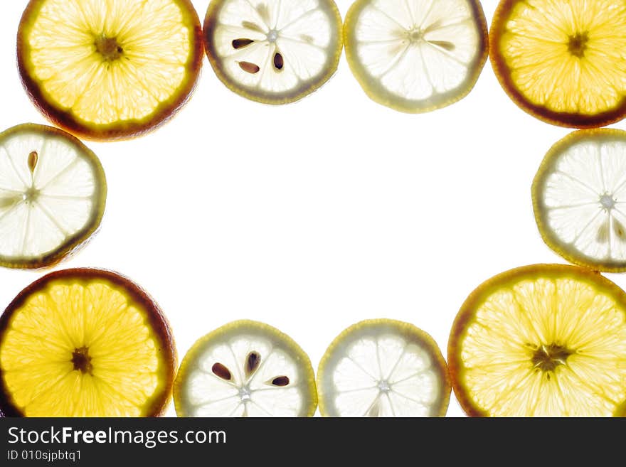 Sliced orange and lemon isolated on white background, citrus frame