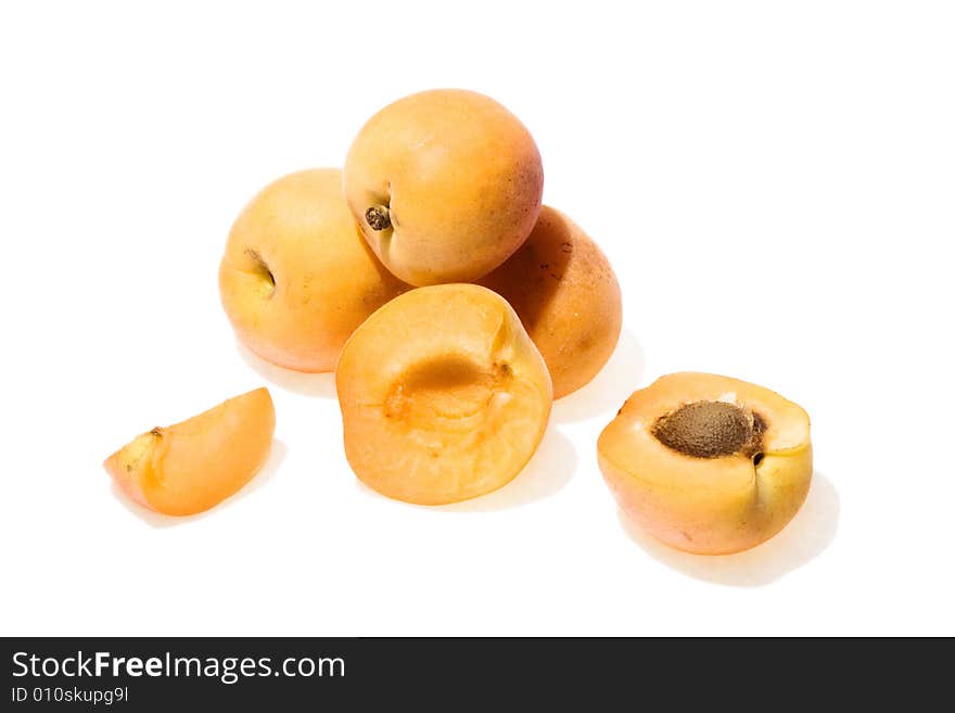 Apricots isolated on white background