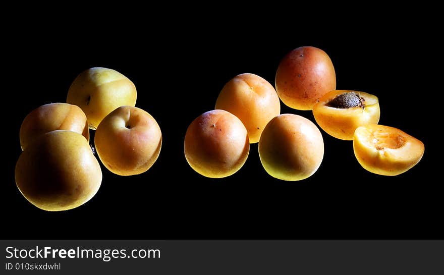 Apricots isolated on black background. Apricots isolated on black background