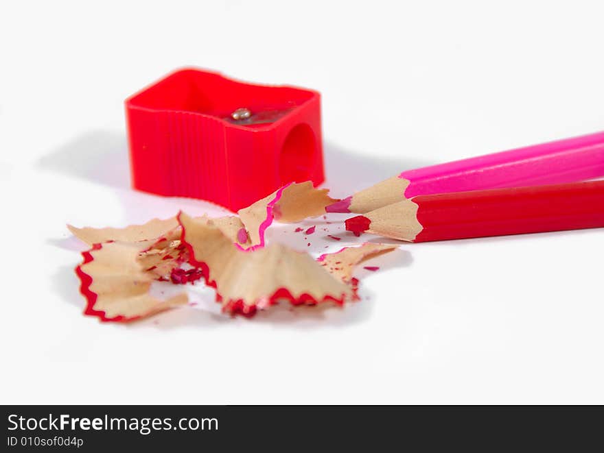 Pencil and sharpener on a white background