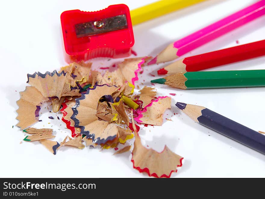 Pencils and sharpener on a white background