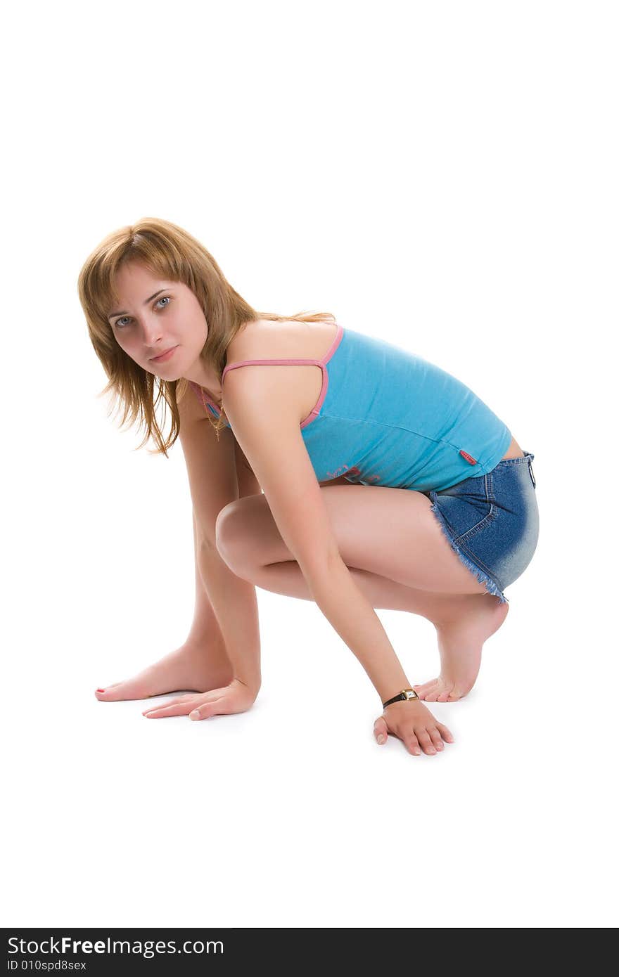 Nice girl carries out sports exercises isolated on a white background