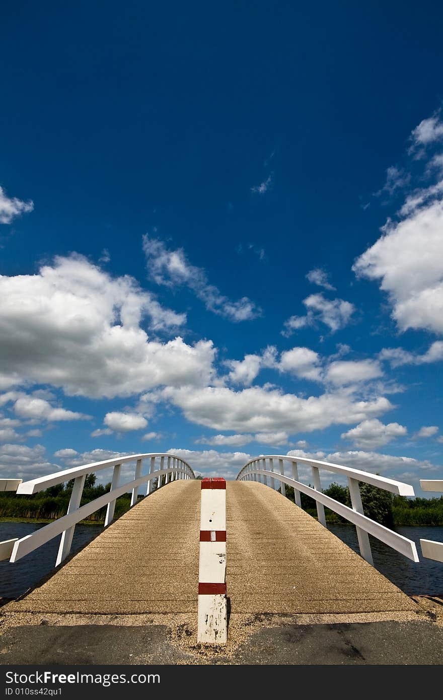 Footbridge over a dutch canal.