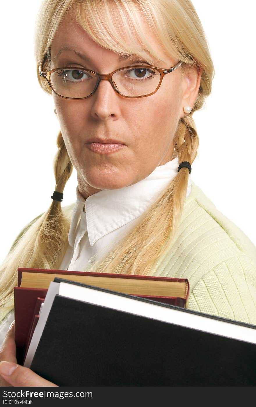 Attractive Woman with a Stack of Books Isolated on a White Background. Attractive Woman with a Stack of Books Isolated on a White Background.