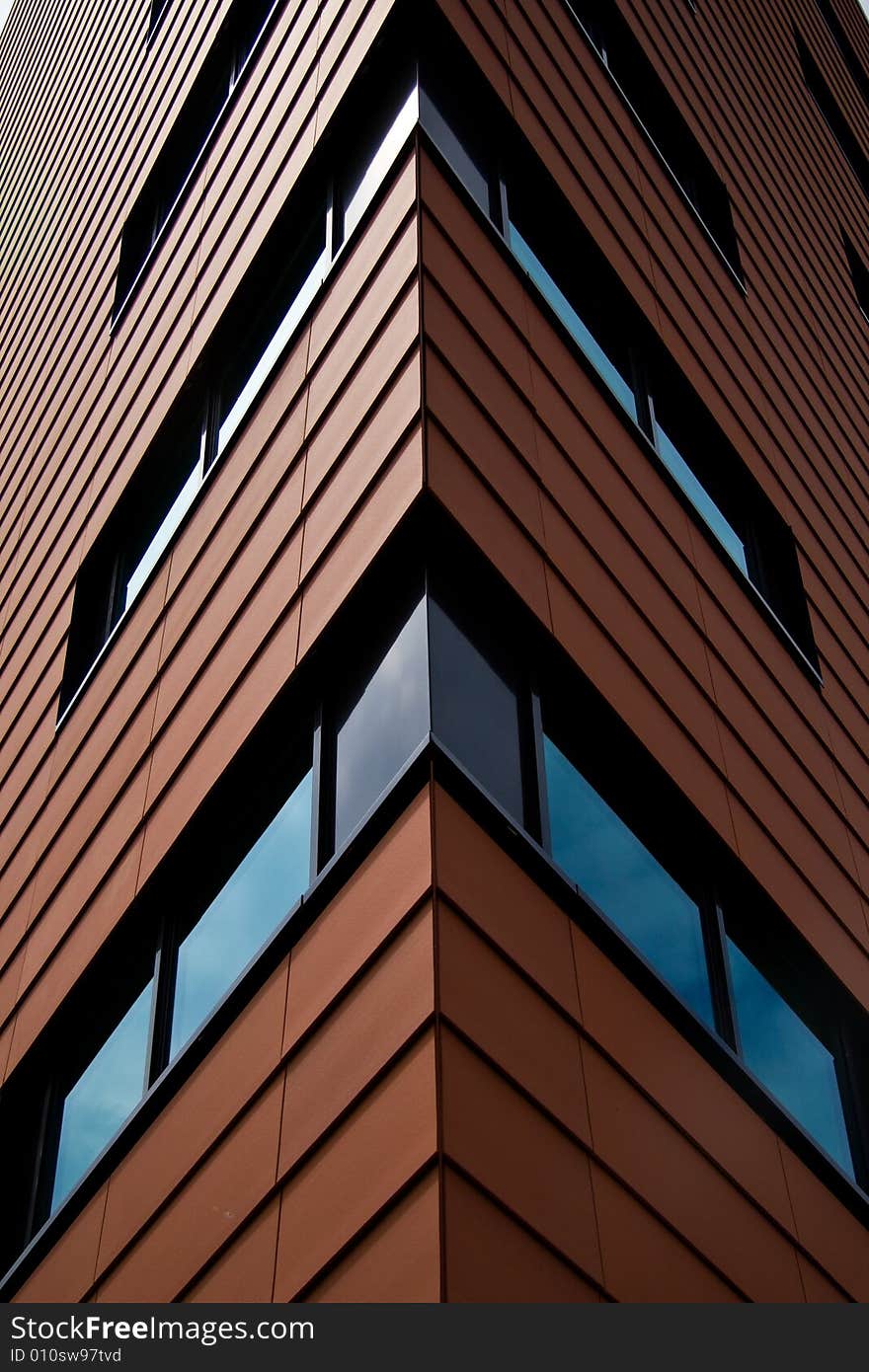 Corner of a brown building. Corner of a brown building.