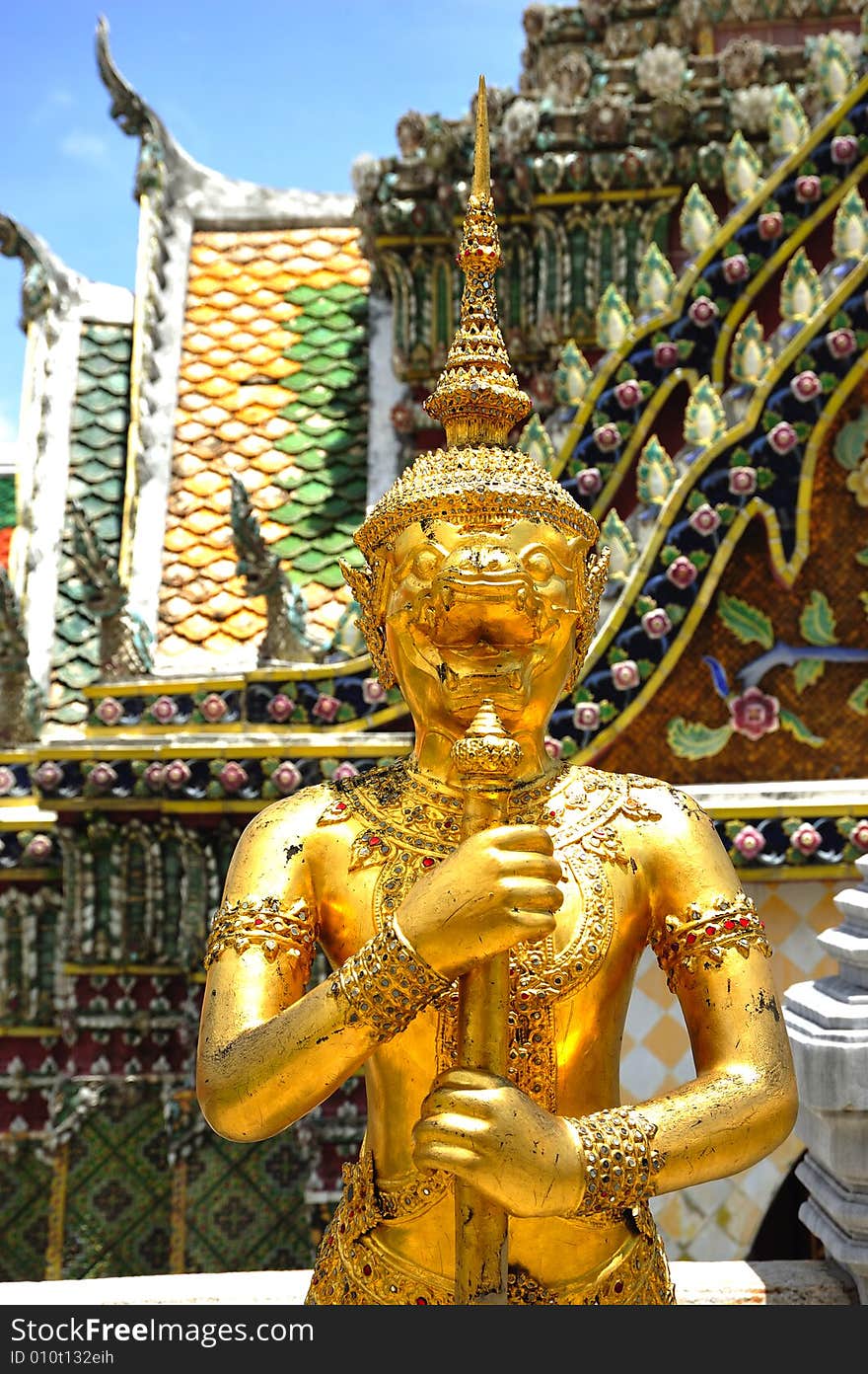 Thailand Bangkok; the wat Phra Kaew shelter the most sacred image of Thailand the Emerald Buddha. The temple is situated in the northeast corner of the Grand Palace. View of a giant or yakshas. Thailand Bangkok; the wat Phra Kaew shelter the most sacred image of Thailand the Emerald Buddha. The temple is situated in the northeast corner of the Grand Palace. View of a giant or yakshas