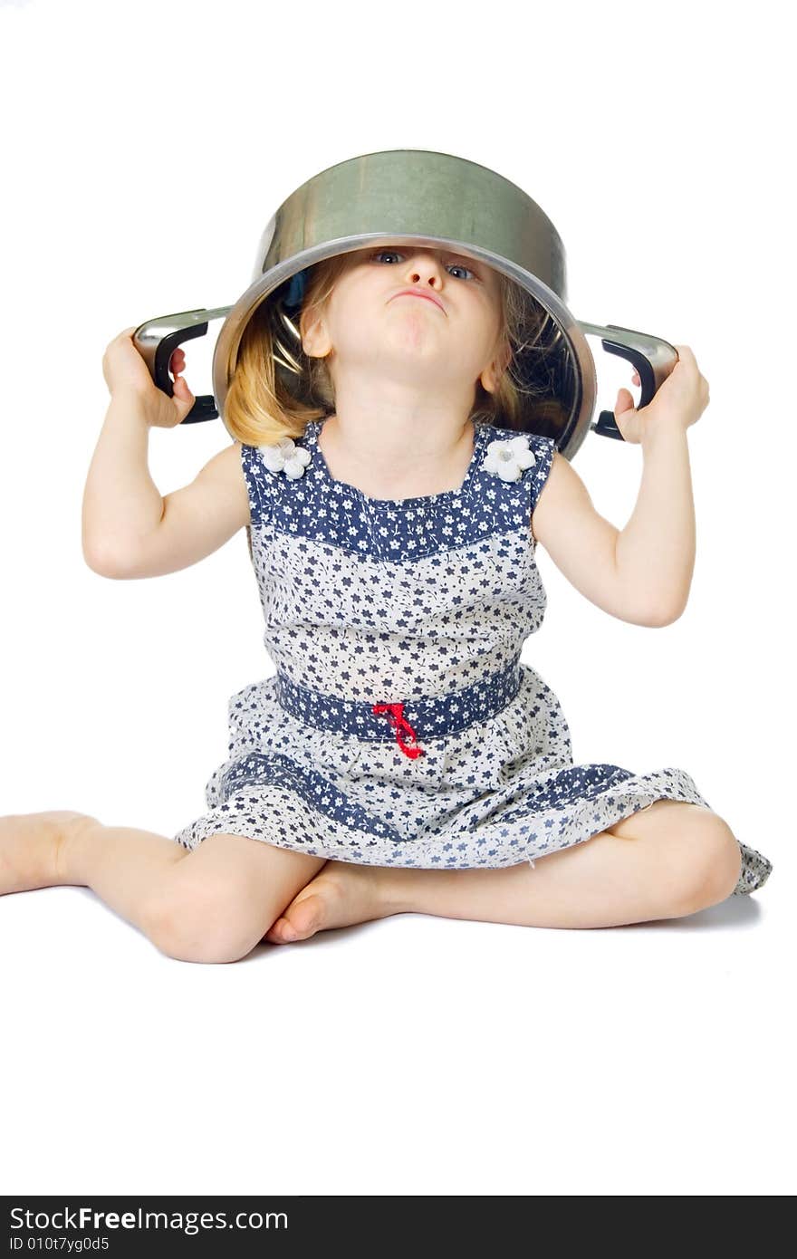 Little cute girl holding saucepan over her head, isolated