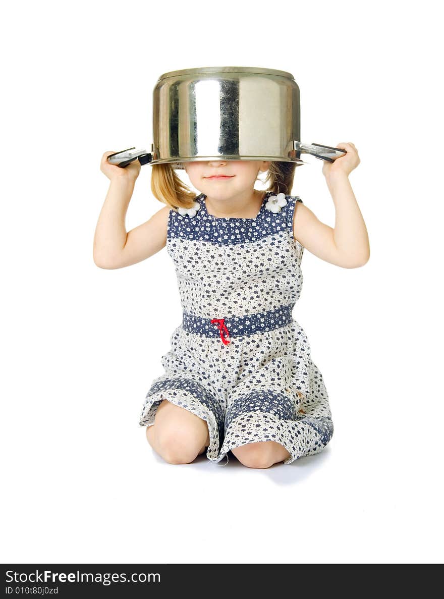 Little cute girl holding saucepan over her head