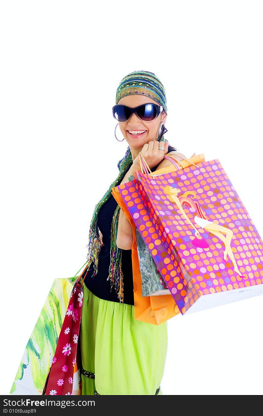 Happy young lady holding shopping bags, isolated, on white background. Happy young lady holding shopping bags, isolated, on white background