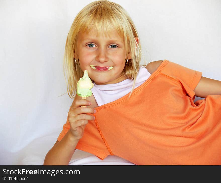 Adorable girl eating an ice cream. Adorable girl eating an ice cream