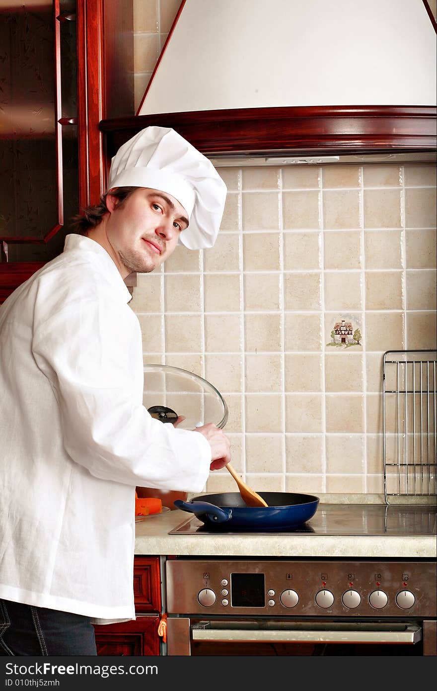 Cook cooking on the kitchen. Cook cooking on the kitchen