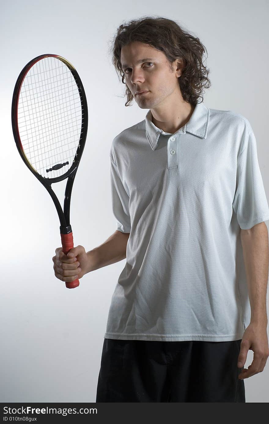 Man Holding Tennis Racket - vertical