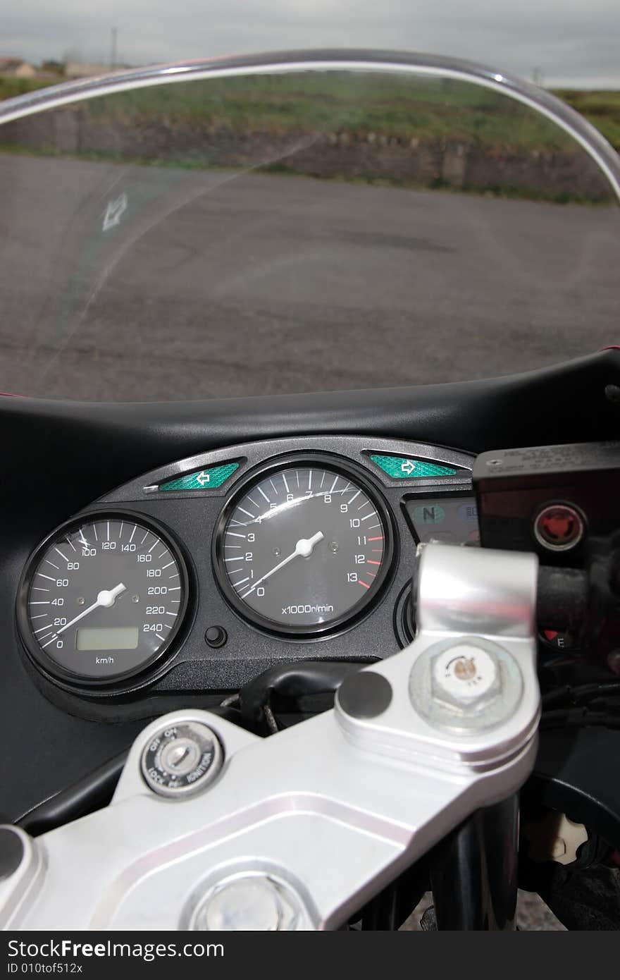 Beautiful closeup of a generic front end of a motorcycle dashboard. Beautiful closeup of a generic front end of a motorcycle dashboard