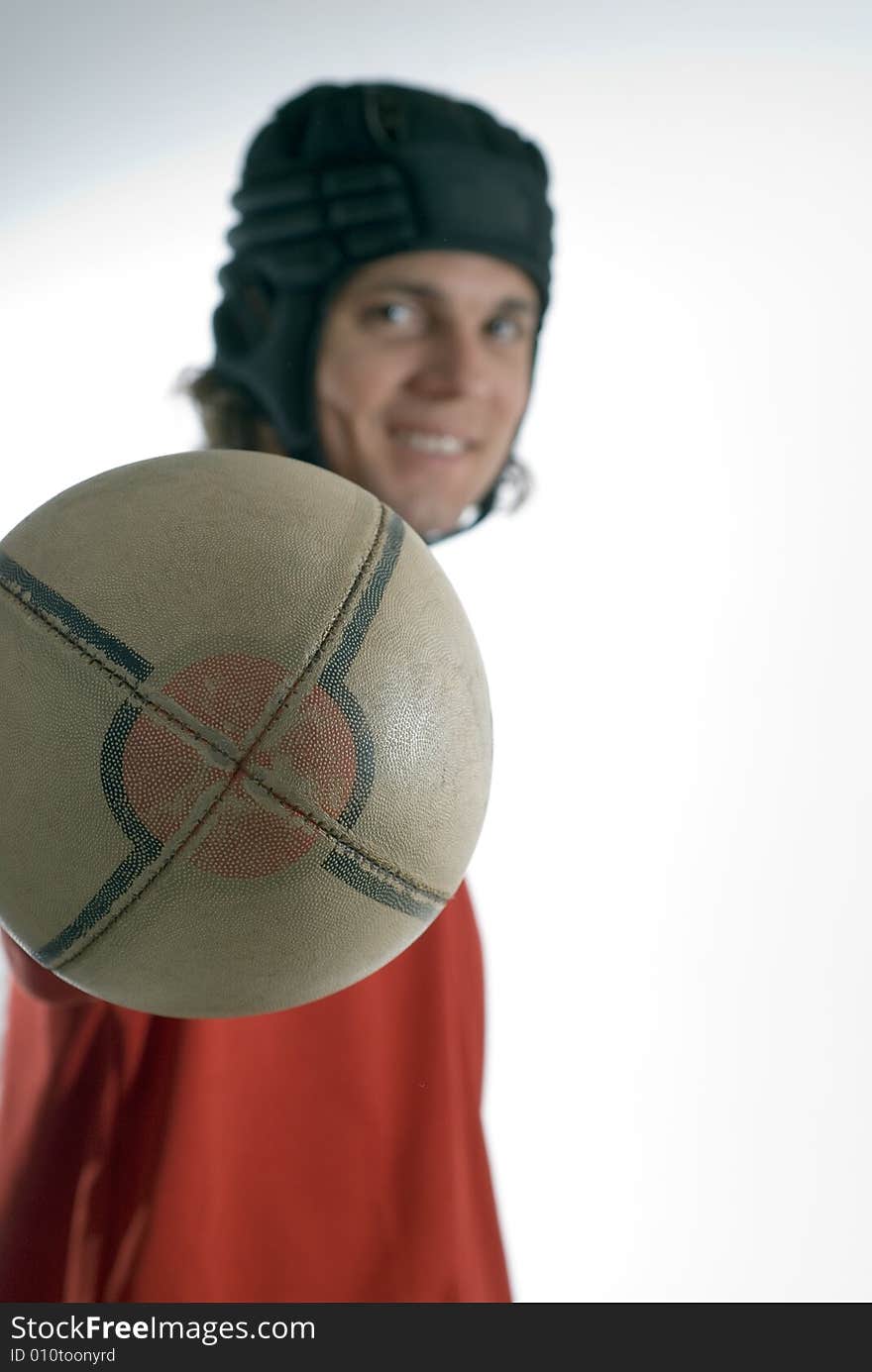 Man Holding a Football - Vertical