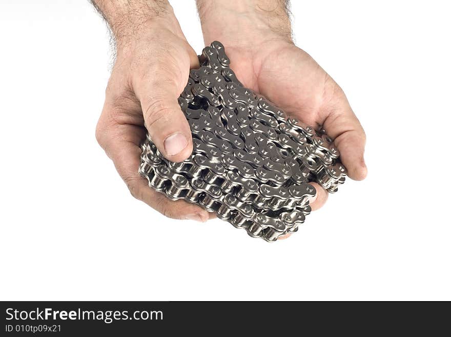 Hands with metal link chain on a white background