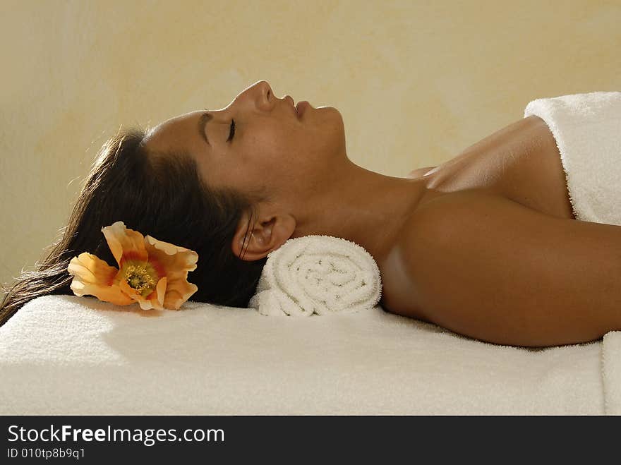 Woman resting on a massage table. Woman resting on a massage table