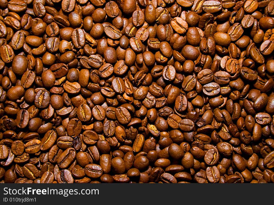 Heap of brown coffee beans. Heap of brown coffee beans