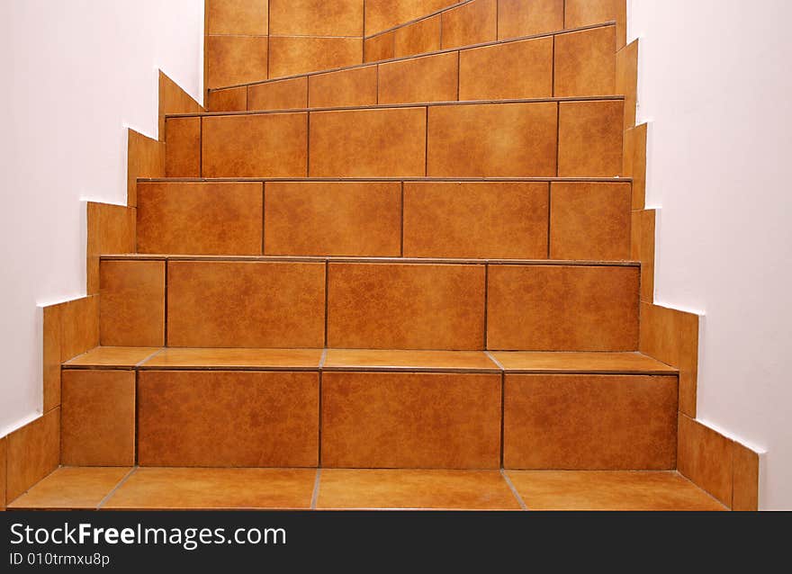 Stairway with brown floor tiles. Stairway with brown floor tiles