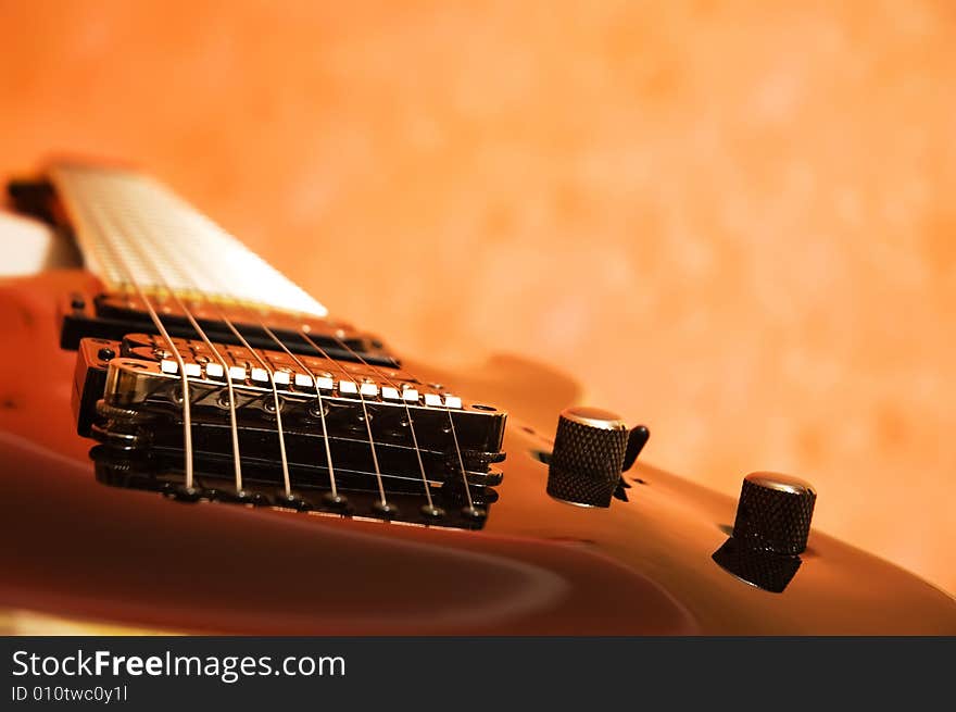 Close-up of the black electric guitar