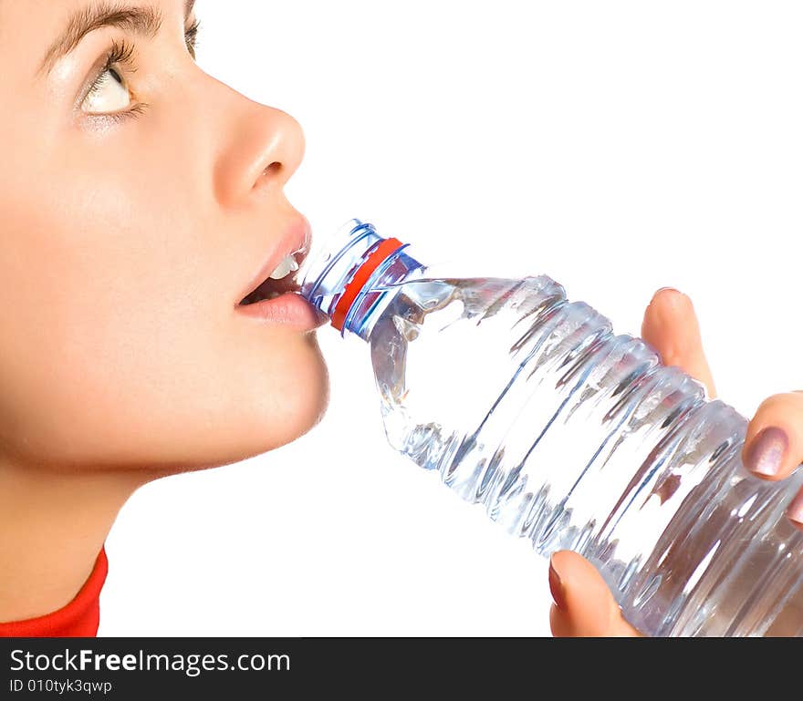 Young  girl with mineral water (isolated on white). Young  girl with mineral water (isolated on white)