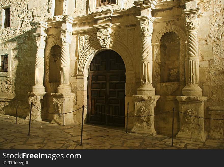 The Alamo Door at night.