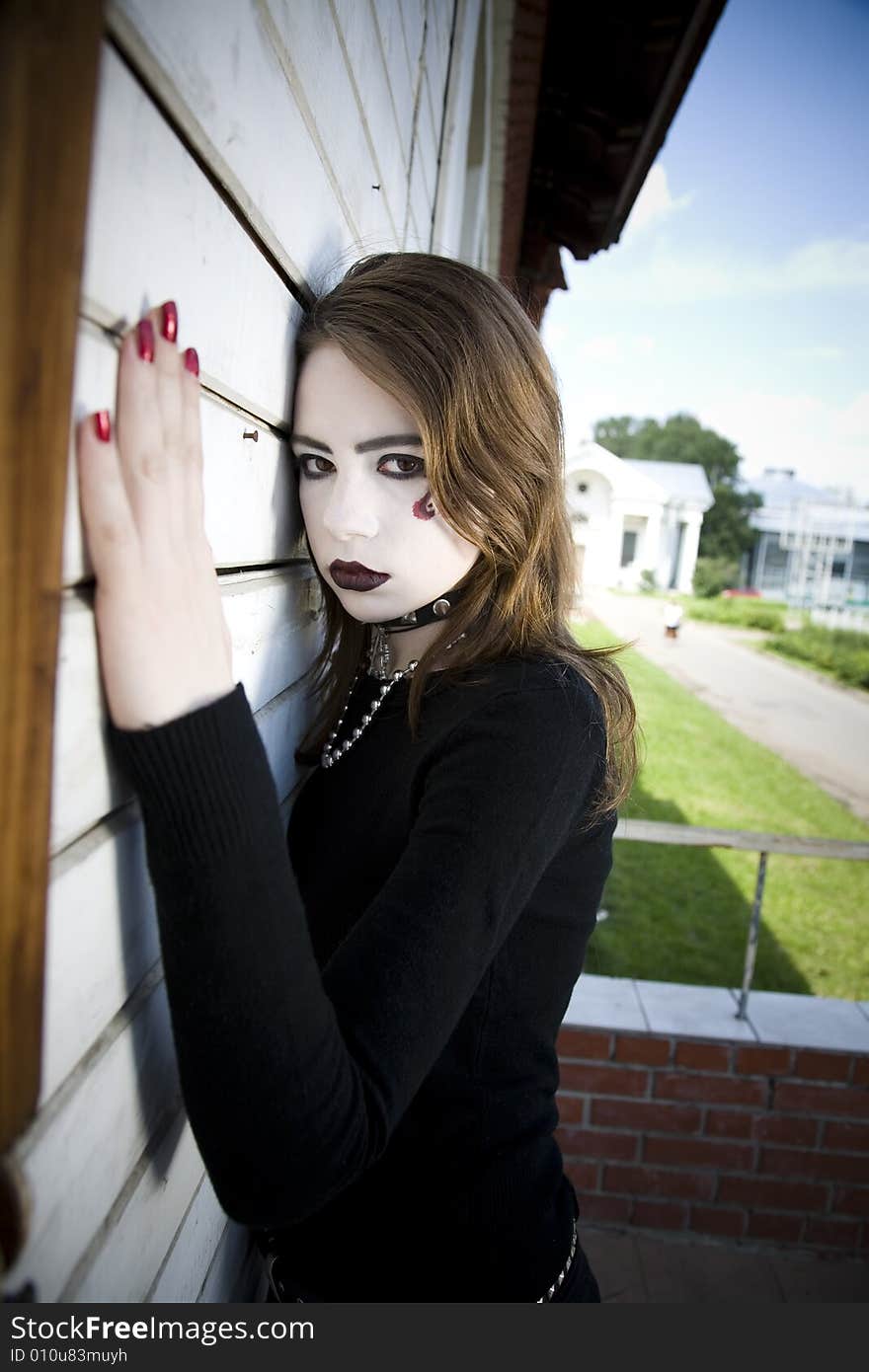 Beautiful Gothic Girl Near A Wall