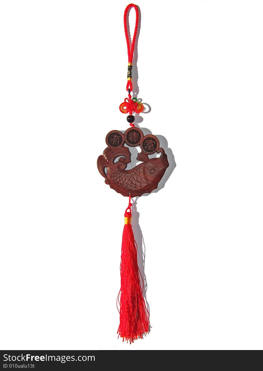 Wood fish with red tassel