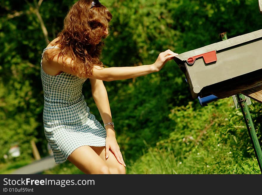 Girl Checking Mail