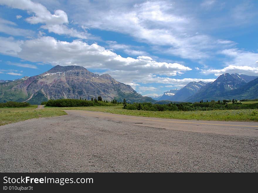 Landscape of mountains and road in waterton lake national park, alberta, canada. Landscape of mountains and road in waterton lake national park, alberta, canada