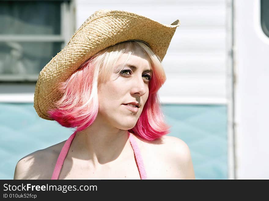 Woman in front of Travel Trailer